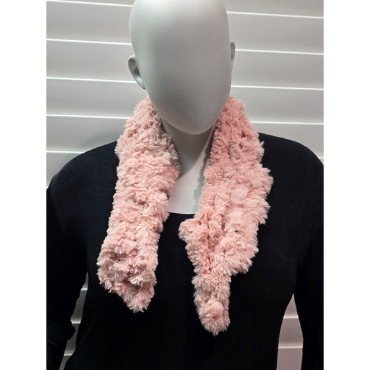 Short pink fuzzy scarf worn on mannequin
