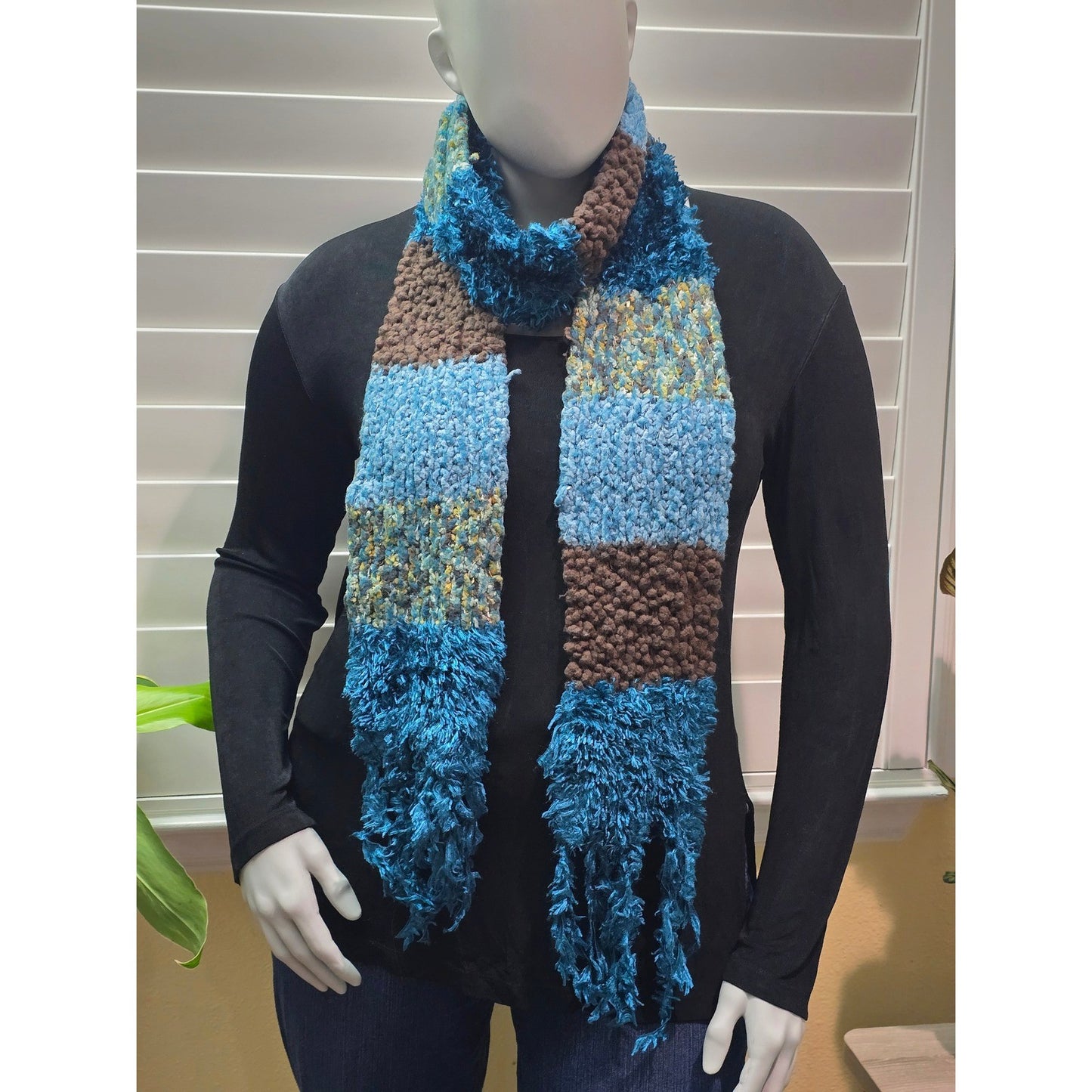 Cejon multicolor knit fringe scarf styled as a neck wrap