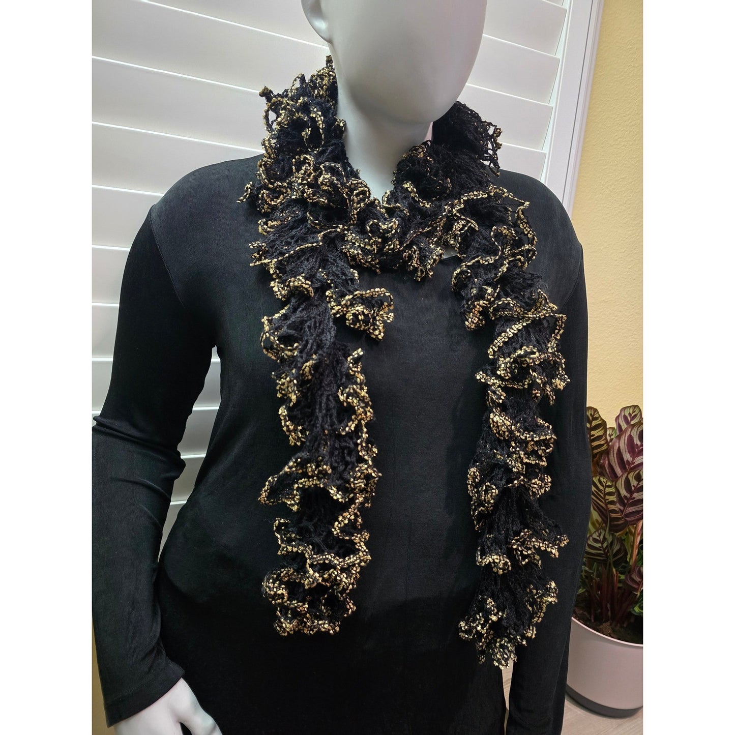 Black and gold ruffle scarf close view
