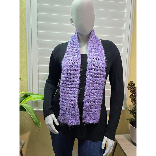 Purple fuzzy chunky knit scarf worn on mannequin
